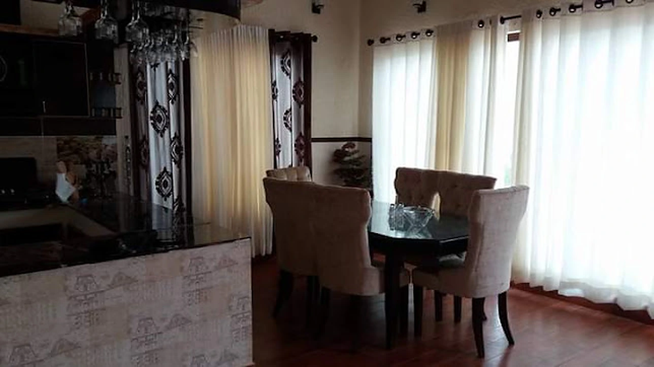 Dining table beside the kitchen counter