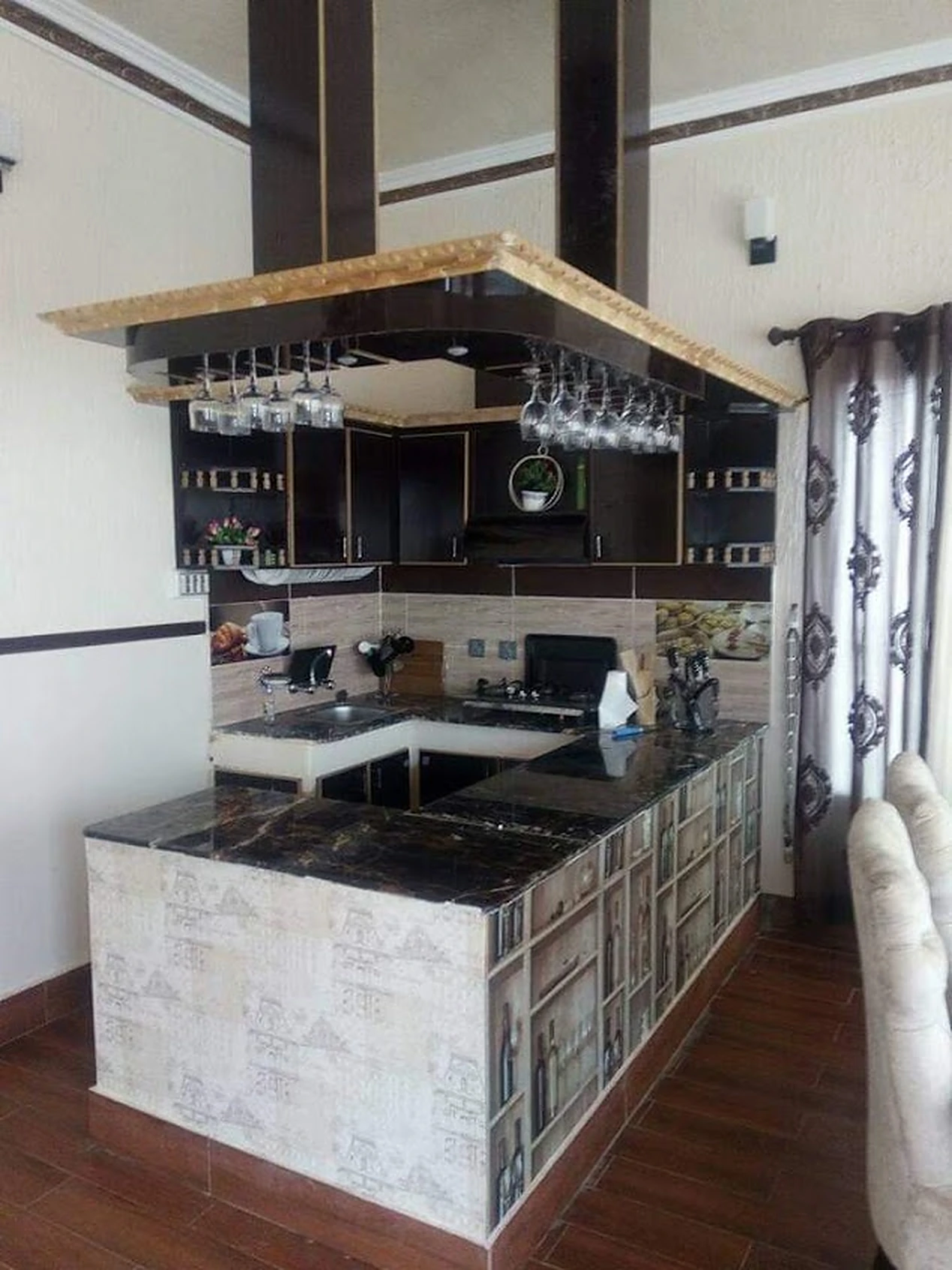 Kitchen bar counter with hanging glass rack
